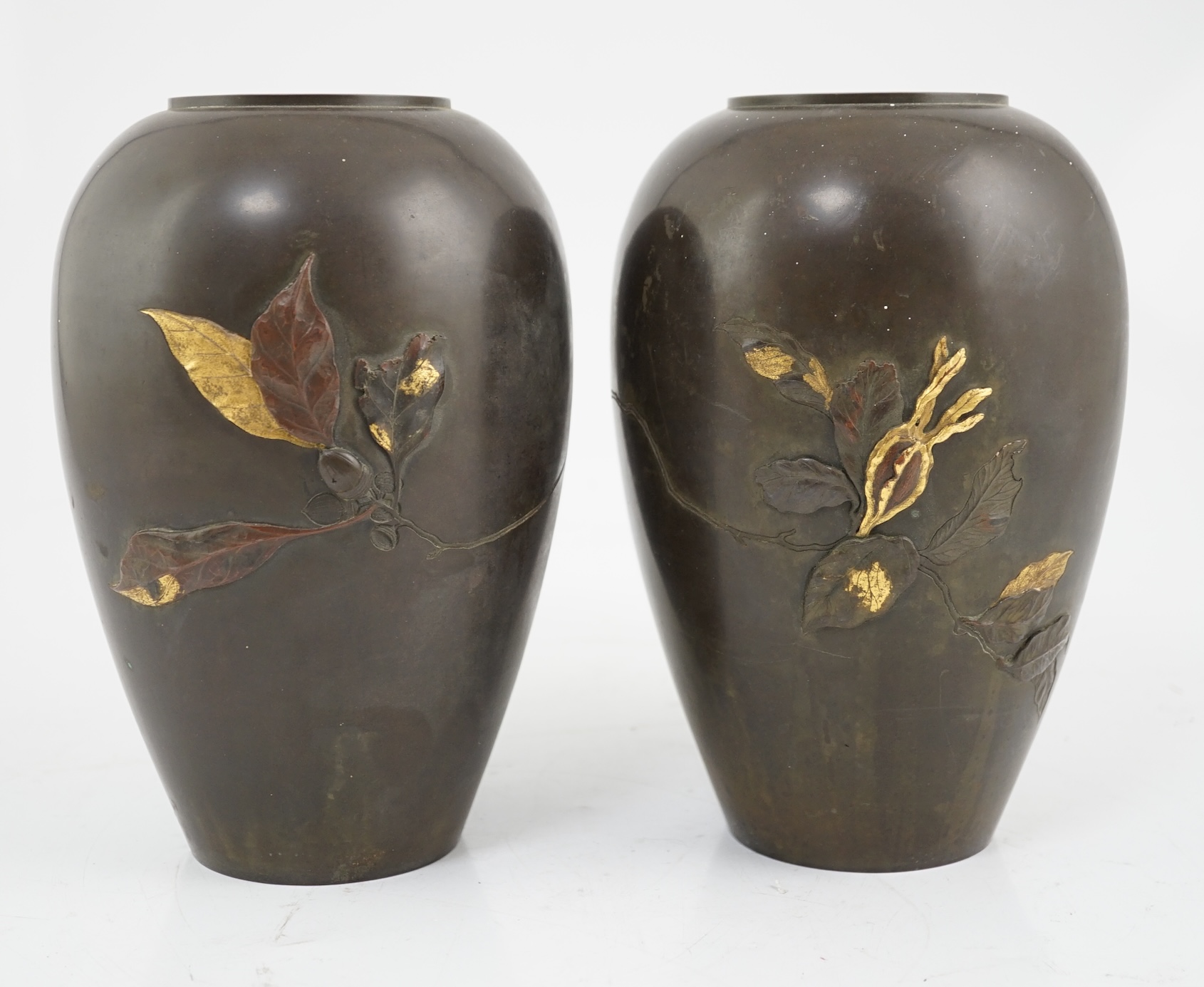 A pair of Japanese bronze and mixed metal ovoid vases, Meiji period